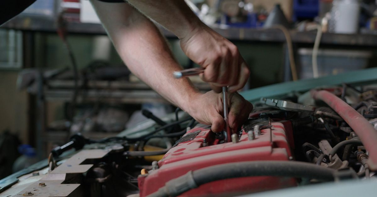 Professional automotive workshop and engine repair environment showing expertise and precision